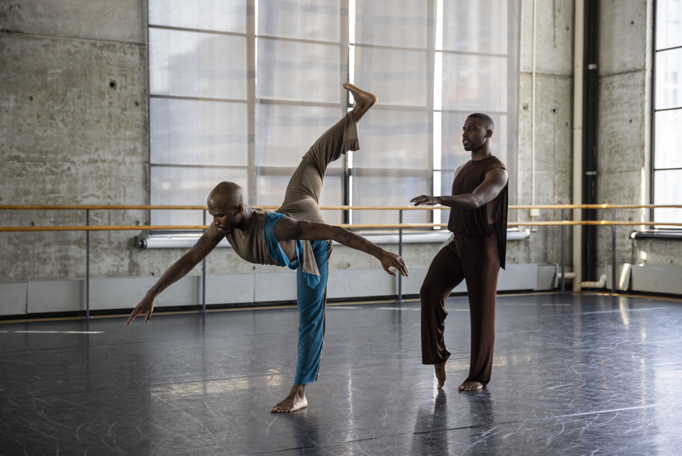 Donovan Reed leans forward into a penchee as Claude